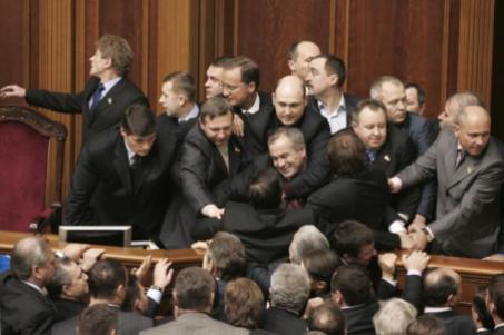 185429-pro-government-deputies-scuffle-with-opposition-deputies-in-parliament